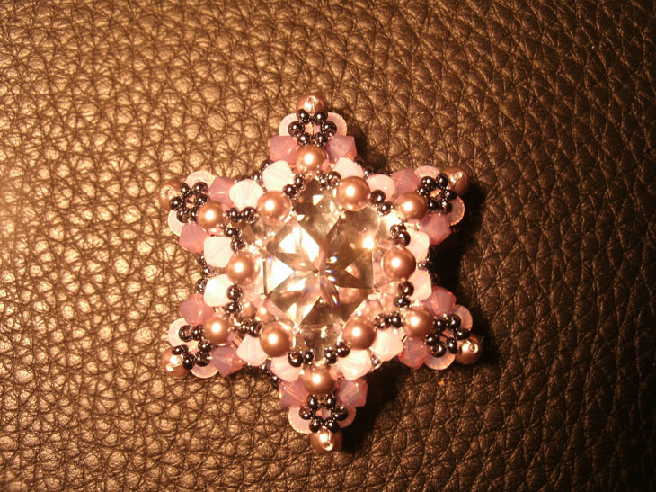 3D Stern aus Swarovski Steinen rosa/lila